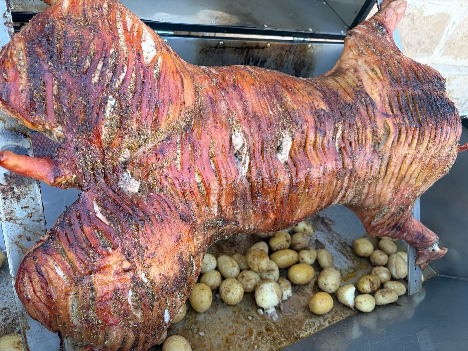 Whole lamb on a rotating spit